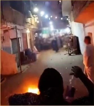بالفيديو: مصرية تعتدي على جيرانها بزجاجات المولوتوف في عين شمس
