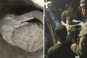 ‏تجهيز طفل للدخول إلى البئر في محاولة جديدة لإنقاذ الطفل السوري "علي عبدي"