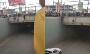 بالفيديو: لحظة محاولة شاب يمني الانتحار بالقفز من أعلى جسر مشاة في صنعاء بسبب مضايقات أحد أفراد مليشيا الحوثي له
