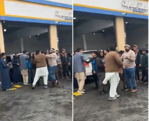 فاجأهم بصرخة قوية.. بالفيديو: مواطن يفض مشاجرة عمالة أمام محل صيانة سيارات