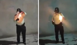 بالفيديو: شرطي إيراني يحرق صورة خامنئي ويكتب “يحيا الشاه” في مشهد تحدٍّ علني