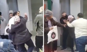 "أقسم بالله لهضربه".. بالفيديو..مشاجرة بالأيدي بين سيدة ورجل مسن أمام ماكينة صرافة في مصر
