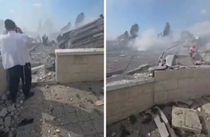 بالفيديو ... تدمير حي كامل إثر انفجار صاروخ إيراني قرب تل أبيب