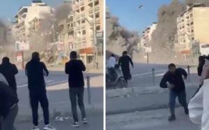 بالفيديو.. تناثر الأموال في الهواء بعد قصف إسرائيلي استهدف مؤسسة القرض الحسن التابعة لحزب الله في لبنان