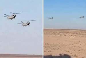 بالفيديو..  مروحيات أمريكية تحلق على ارتفاع منخفض في صحراء النجف بالعراق