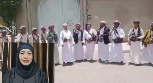 بالفيديو.. شيخ قبيلة يمني يقف أمام منزل امرأة زعمت بأنها ابنة صدام حسين  ويكشف سبب قدومها من العراق في ضيافة الرئيس الراحل علي عبدالله صالح
