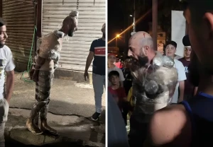 بالفيديو.. لبنانيون يقبضون على تاجر مخدرات ويربطونه بعمود حديدي ويلفون المضبوطات على جسده في طرابلس
