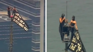 على ارتفاع 443 مترًا.. بالفيديو.. رجل وامرأة يتسلقان قمة مبنى في نيويورك ويرفعان لافتة مفاجئة