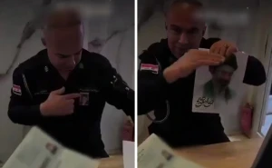 بالفيديو.. موظف عراقي بوزارة الداخلية العراقية يضع صورة المرشد الإيراني الجديد على بدلته الرسمية