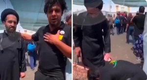 بالفيديو.. عراقي يقبّل قدم  وحذاء معمم إيراني خلال زيارته لكربلاء