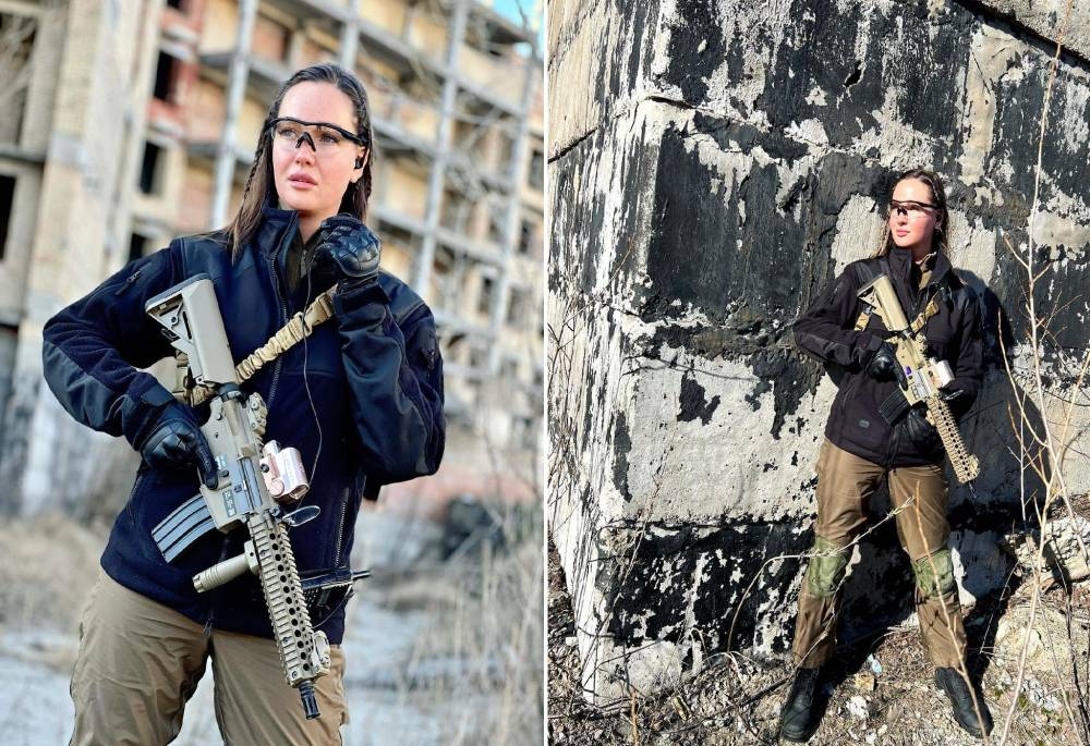 شاهد .. ملكة جمال أوكرانيا السابقة تحمل السلاح وتهدد : " كل من يعبر الحدود الأوكرانية بقصد الغزو سيقتل! "