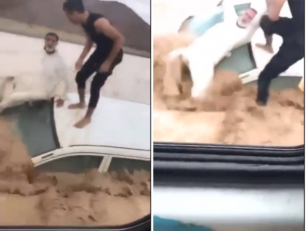 شاهد: لحظة إنقاذ مسن باكستاني علقت سيارته في سيول ينبع