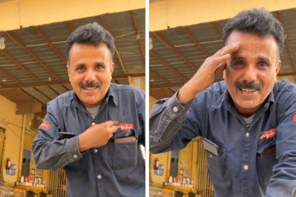 شاهد: عامل يمني في محل بنشر  يغني  " في غربتي تغرب النور عن عيني"  وصوته يثير إعجاب مواقع التوصل