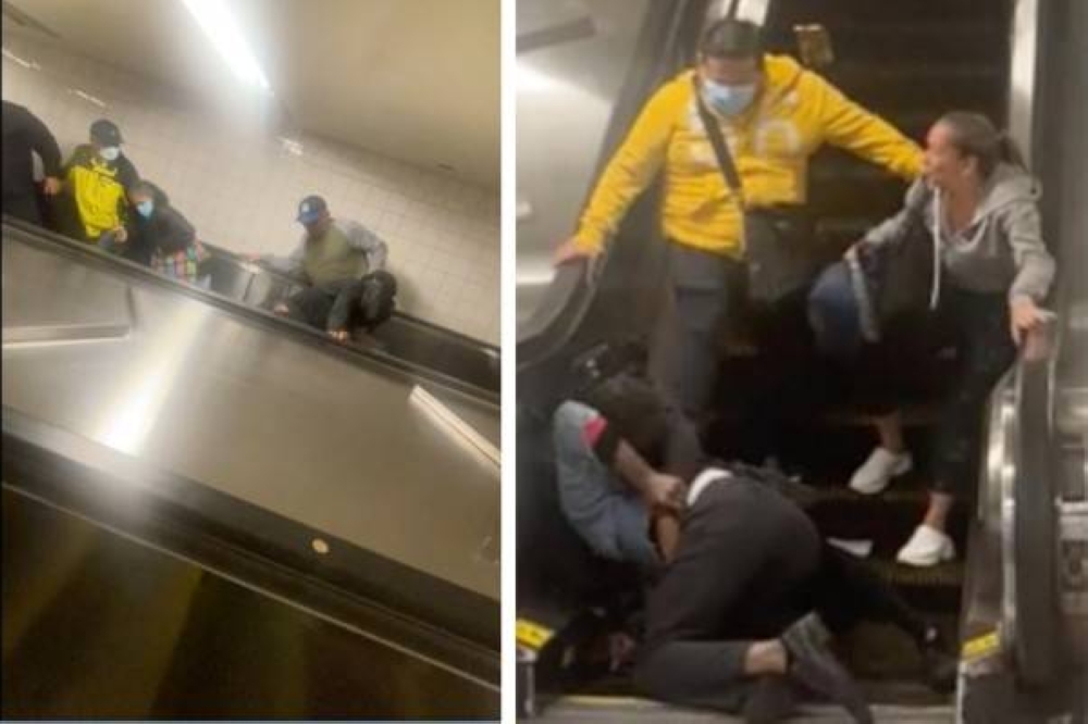 تدحرجا سوياً.. شاهد: شجار عنيف بين رجلين أعلى سلم كهربائي في محطة مترو بأمريكا