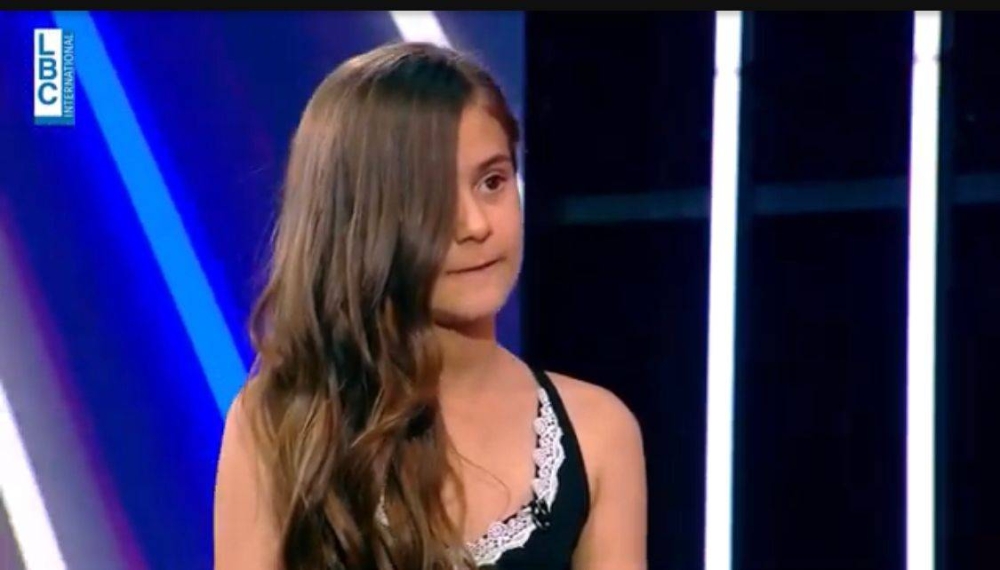 وصفوها بـ "الجنية".. شاهد: طفلة تخفي نصف وجهها بسبب وحمة سوداء