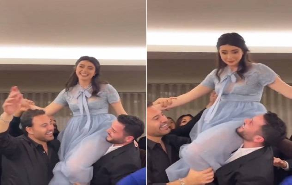 شاهد.. عاصي الحلاني يحمل ابنته "ماريتا " على الأكتاف وهي ترقص في حفل خطوبتها