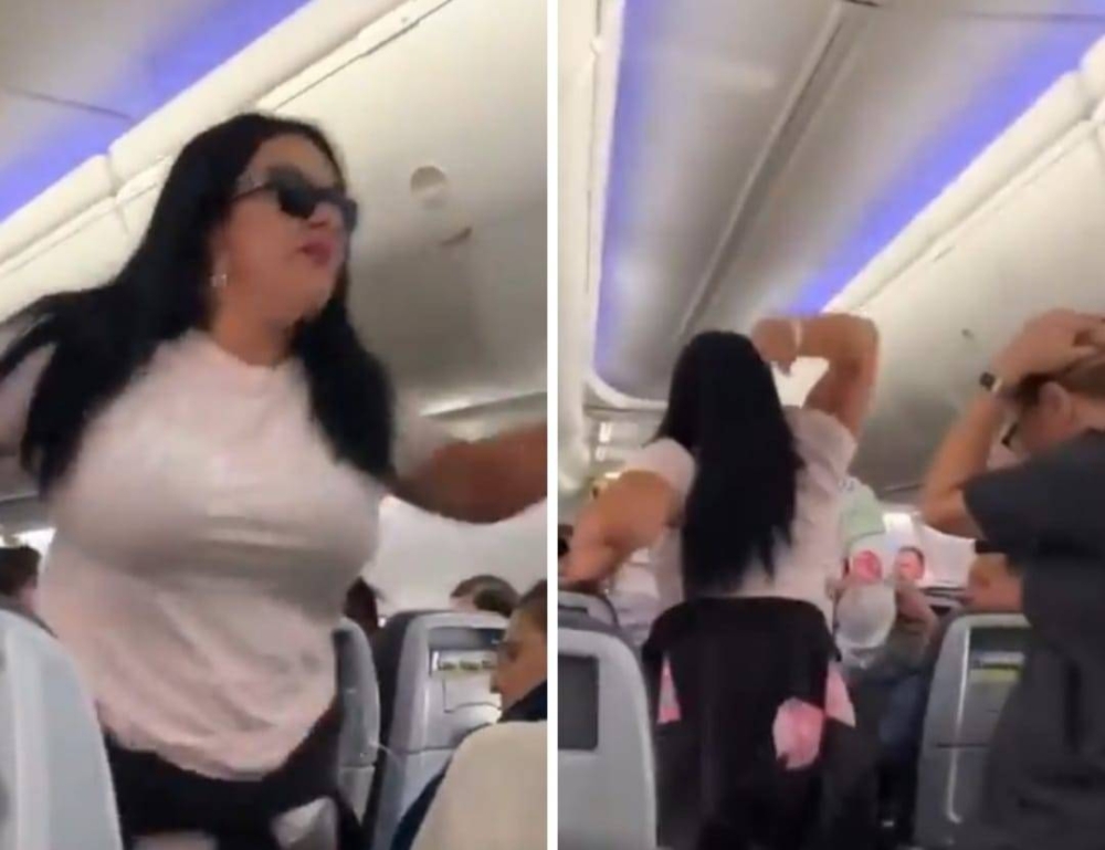 شاهد : امرأة تنفجر في وجه صديقها وتشتبك معه بالأيدي بعدما ضبطته ينظر إلى أخرى داخل طائرة