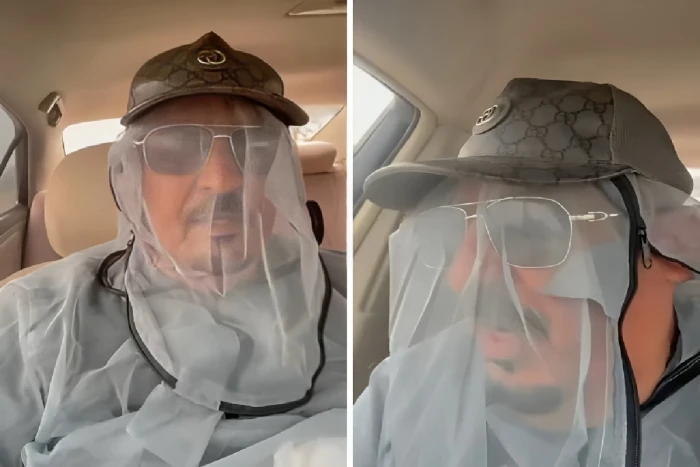 بالفيديو.. سائح خليجي يكشف سبب ارتدائه غطاء بلاستيكي على كامل جسده في صلالة العمانية