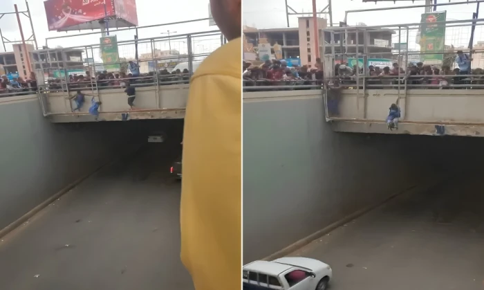 بالفيديو: لحظة محاولة شاب يمني الانتحار بالقفز من أعلى جسر مشاة في صنعاء بسبب مضايقات أحد أفراد مليشيا الحوثي له