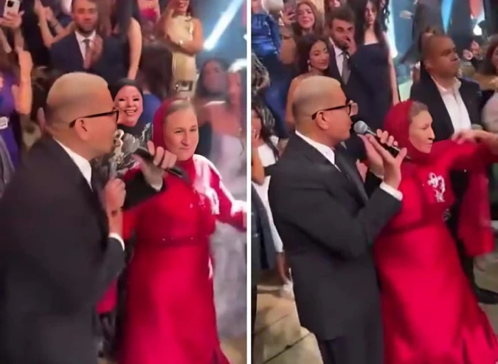 مصر.. بالفيديو.. ردة فعل والدة عروس عند رؤية عمرو دياب في حفل زفاف ابنتها