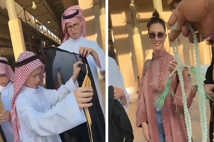 "ظهروا يرتدون الزي السعودي".. بالفيديو.. بائع سبح في سوق الزل بالرياض يهدي سائحًا  وزوجته وأبنائهما بشوت