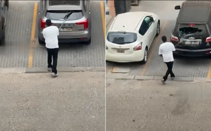 بالفيديو: شاب في حالة غير طبيعية يحطم زجاج 7 سيارات متوقفة أمام منازل أصحابها في الكويت