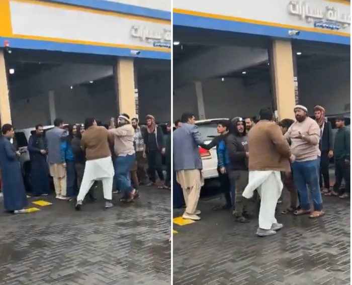 فاجأهم بصرخة قوية.. بالفيديو: مواطن يفض مشاجرة عمالة أمام محل صيانة سيارات