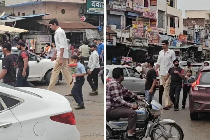 بالفيديو.. رجل طويل القامة يلفت الأنظار أثناء سيره وسط  شارع في الهند