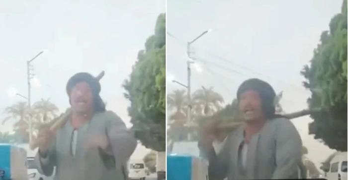 بالفيديو.. رجل صعيدي يحلف بالطلاق ويوقف المارة بعصا لإجبارهم على الإفطار معه في قنا