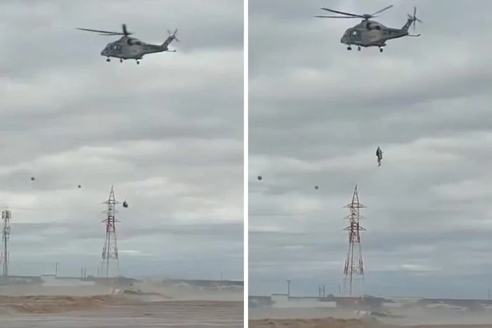 بطائرة هليكوبتر.. بالفيديو.. لحظة إنقاذ أشخاص علقوا داخل مركبة وسط السيول في سلطنة عمان