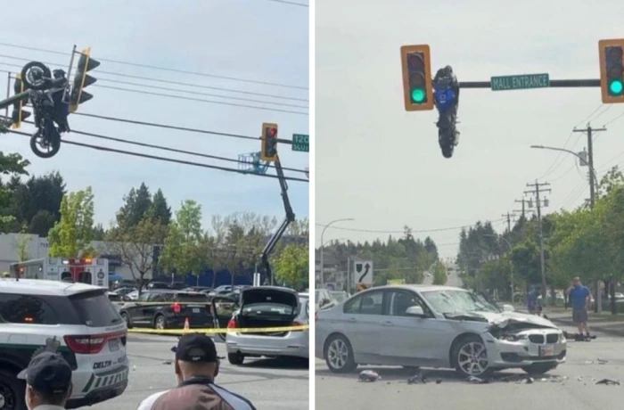 فيديو يوثق  لحظة أغرب حادث مروري لدراجة نارية تطير في الهواء وتتعلق على إشارة مرور بكندا