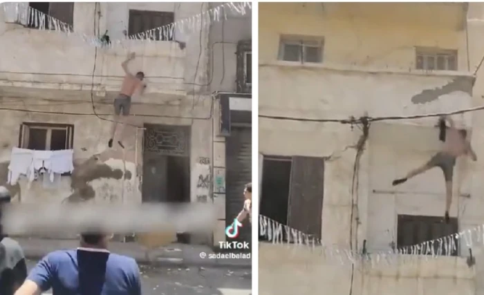 "الماسورة هتوقع بيك".. بالفيديو : صرخات الجيران تلاحق لصاً غامر بحياته من أجل  سرقة "أحذية"!
