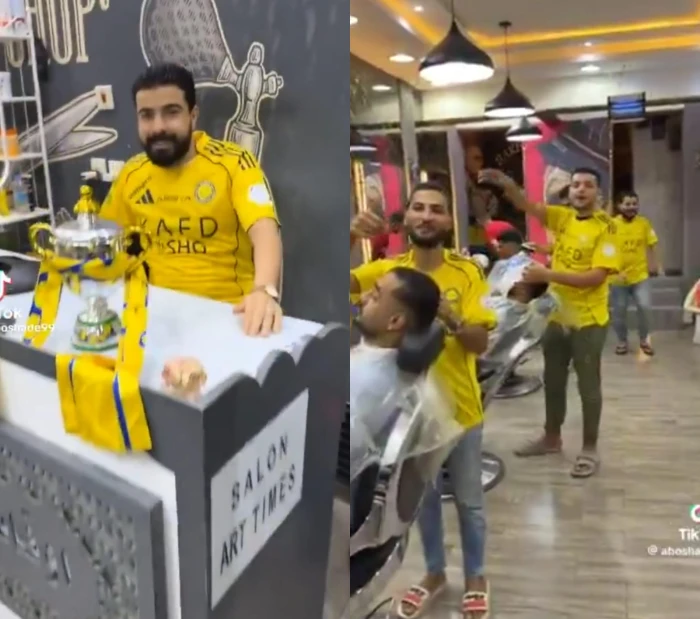 بالفيديو : عمال صالون حلاقة يرتدون قميص النصر ويحتفلون برفع الكأس