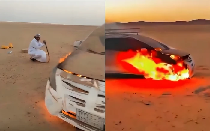 بالفيديو: نيران تلتهم سيارة " نيسان صني" في الربع الخالي ومحاولة يائسة من السائق  لإخمادها بالتراب
