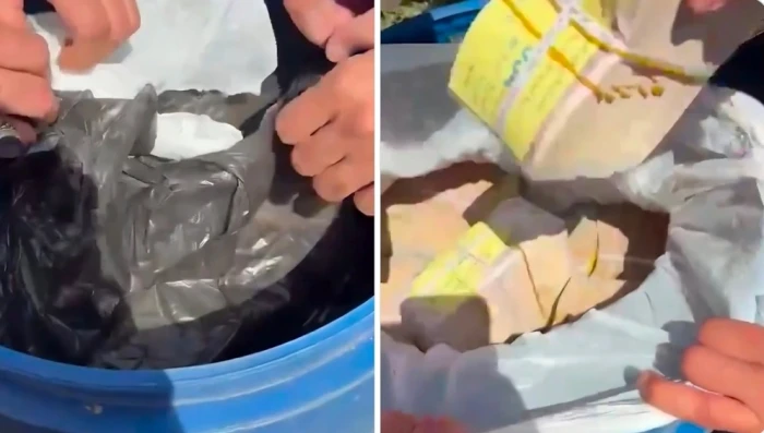 بالفيديو.. لحظة العثور على ملايين ضخمة مخبأة داخل براميل مخلل في قضية فساد كبرى في العراق