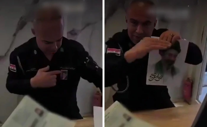 بالفيديو.. موظف عراقي بوزارة الداخلية العراقية يضع صورة المرشد الإيراني الجديد على بدلته الرسمية