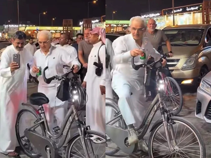 فيديو متداول.. الوليد بن طلال يقود دراجة ويتناول «سفن أب» ويلتقط الصور مع الجمهور في مكان عام