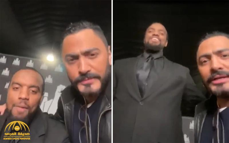 شاهد : الفنان تامر حسني يوثق فيديو طريف مع أطول فرد أمن سعودي