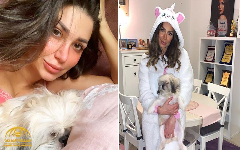 شاهد .. صورة للفنانة "سارة نخلة" تحتضن كلبها تثير سخرية واسعة !