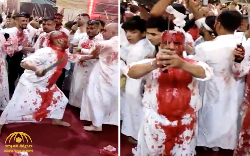بالفيديو : عراقي يضرب رأسه بالسيف عدة مرات في يوم عاشوراء.. شاهد : ردة فعله حين حاول أحد الأشخاص منعه