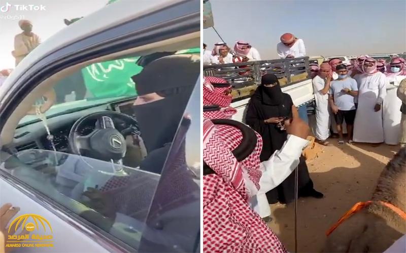 شاهد.. امرأة تقود "جيب لكزس" تشارك بمزاد للإبل في حفر الباطن: "تكفون لا أحد يقروشني.. أنا حرمة أمشي سيده"