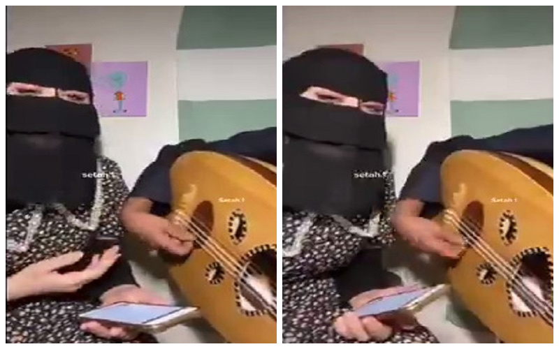 شاهد.. فتاة "مبرقعة" تغني "خلاص من حبكم يا زين عزلنا" على عزف العود