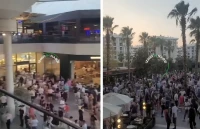 بالفيديو: ذعر وهروب المتسوقين في مركز تجاري بأزمير لحظة شعورهم بالزلزال الذي ضرب تركيا